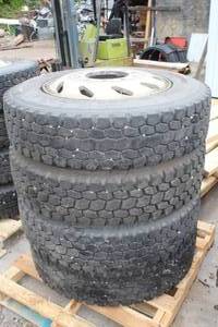 Lot of (4) 28575R24.5 Semi Tires with 10-log Rim