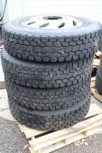 Lot of (4) 28575R24.5 Semi Tires with 10-log Rim