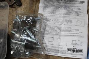 Transfer Tank Mounting Studs with Rubber Bushings, Nuts, and Washers