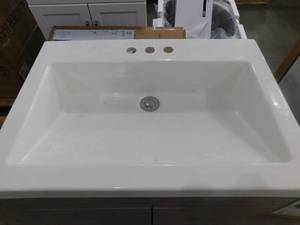 lot 7 image: Glacier Bay Jayli 24 in. W x 17 in. D x 34 in. H Bath Vanity in Haze with Cultured Marble Vanity Top in White with White Sink