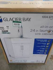 lot 10 image: Glacier Bay All-in-One Stainless Steel 24 in Laundry Sink with Faucet and Storage Cabinet in White