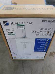 lot 12 image: Glacier Bay All-in-One Stainless Steel 24 in Laundry Sink with Faucet and Storage Cabinet in White