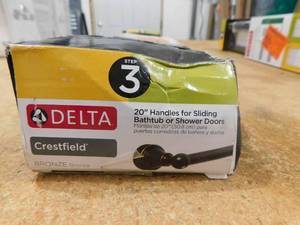 lot 78 image: Delta Crestfield 20 in. Handles for Sliding Shower or Bathtub Door in Bronze (1-Pair)