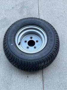 lot 64 image: New Trailer Wheel and Tire