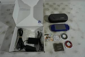 lot 47 image: Sony PSP Video Game System with Games - Special Edition Blue