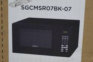 lot 120 image: NEW Sunbeam .7 Cu Ft Microwave Oven