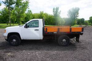 lot 1 image: 2013 GMC Sierra 3500 Duramax 4 x 4 Flatbed Pick Up Truck