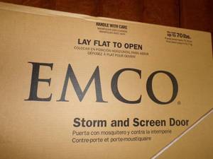 lot 51 image: 36 Black Storm Door