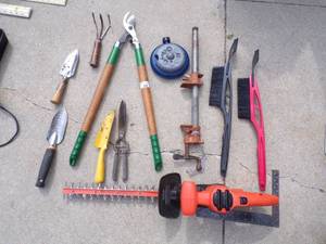lot 62 image: Garden Tools with Black N Decker Trimmer