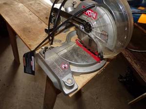 lot 68 image: Bench with Miter saw Ryobi