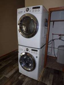 lot 82 image: LG Front Loading Stacked Washer & Dryer set
