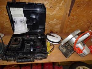 lot 98 image: Cordless drill, skill saw, cord reel