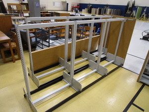 lot 364 image: Double Sided Bookshelf wAdjustable Shelves 25x56 18 Overall (see pics for shelves)