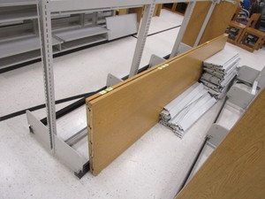 lot 366 image: Double Sided Bookshelf wAdjustable Shelves 25x56 19 Overall (see pics for shelves)