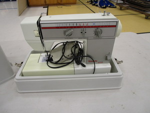 lot 151 image: Sewing Machine