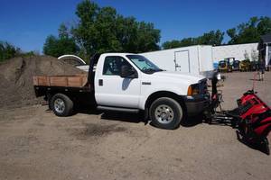 2006 Ford F-250 XL Super Duty Flat Bed Truck With Boss Plow