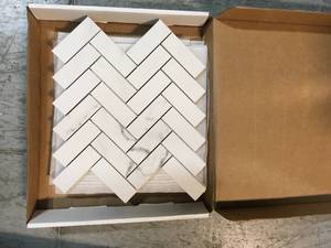 lot 36 image: Florida Tile Home Collection Michelangelo Calacatta White 12 in. x 15 in. x 9 mm Matte Porcelain Herringbone Mosaic Tile (4.77 sq. ft.  Case) - 3 Individual Cases Per Box - Review all pictures