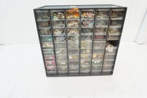multi-drawer container full of jewelry