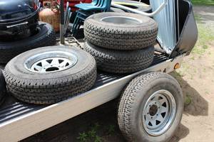 lot 305 image: Lot of (4) Trail Express ST22575R15 Trailer Tires with 6-Lug 15 Rims