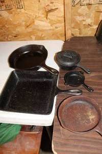 lot 376 image: Lot of (5) Cast Iron Cookware - Square Skillet, Skillets, Pot with Lid