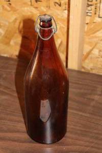 lot 387 image: Glass Flip-Top Bottle