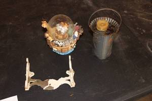 lot 429 image: Lot of (3) Home Dcor - Globe, Candleholder, Rack