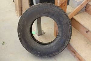 lot 890 image: Firestone LT24575R16 Tire
