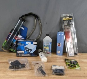 lot 83 image: NEW Lot of Aquarium Accessories and Parts EasyVAC, Diablotek ATX Power Supply, Kick-Ich Aquarium Water Treatment and Much More X