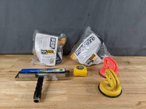 lot 304 image: Assortment of Tools Popcorn Ceiling Scrapers, Measuring Tapes and More Z