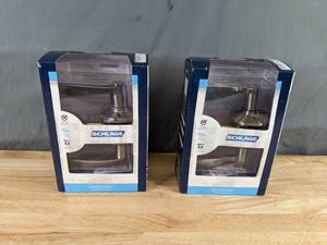 lot 244 image: New Set of (2) Schlage Accent Privacy Leverset Satin Nickel Door Handles Z