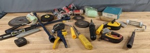 lot 320 image: Mixed Lot 4-Way Tire Iron, Level, Utility Knife, Several NEW Paint Roller Covers, and More Z