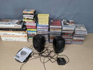 lot 331 image: Music Lovers Lot Approx. 25 Cassette Tapes, Approx. 100 CDs, Philips Portable CD Player and Speakers Q