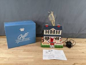 lot 204 image: Avon Gift Collection Patriotic Lighted Fiber Optic House Q