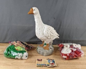lot 180 image: Adorable Goose Lawn Ornament with Outfits for Every Season Q