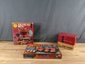 lot 153 image: A Set of Three KitchenBaking Items from NordicWare, Miracle Thaw, and Vegomatic Q