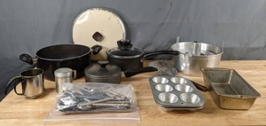 lot 160 image: Kitchen Essentials T-Fal Pot, Cupcake Tins, Loaf Pan, Angel Food Cake Pan, Powder Sugar Shaker, & More Q