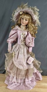 lot 340 image: Collectible Porcelain 26 Doll Q