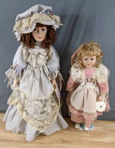 lot 341 image: Collectible Dolls  Darling Duo, One in Blue, One in Pink, Both Adorable Q