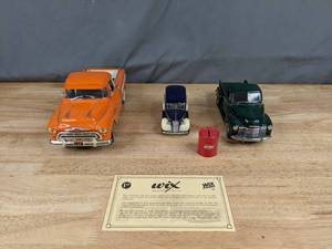 lot 221 image: Collection of (4) Vintage 1953 Chevrolet Pickup, 1957 Chevrolet Pickup, Wix Filters 1939 Chevrolet Canopy Truck and Wix Era Filter Bank Die Cast Models Q