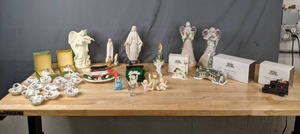 lot 357 image: (13) Mini China Baskets, Assorted Christian Figurines (Angels, Virgin Mary), (2) Vintage Royal Bayreuth Easter Eggs, Christmas Decor, Dept 56 Heritage Village Collection (Village Sign with Snowman, Lionhead Bridge, Village Express Van) N