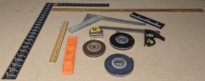 lot 374 image: Carpenters Tools Combo Square, 2 Levels, 3-100 Ft. Tape Reels, Tool Shop 12 Tape Measure, Ruler, Square N
