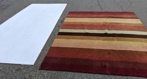 lot 381 image: Crate & Barrel Merlot Stripe Area Rug & Padding R