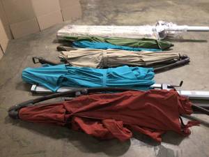 Lot of assorted Outdoor Patio Umbrellas various models and conditions customer returns see pictures