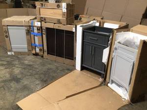 Pallet of assorted base Cabinets and vanities various models and conditions customer returns see pictures