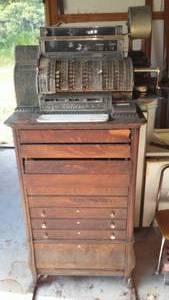 Circa Early 1900s  Antique Brass Cash Register with keys on Wood Cash Stand