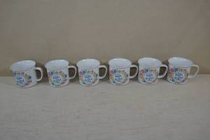 lot 165 image: Cape Shore Salty Kisses and Starfish Wishes Watercolor Cottage Mugs