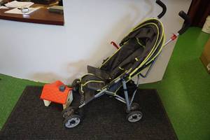 lot 174 image: Babies R Us Umbrella Stroller, plus Toy House