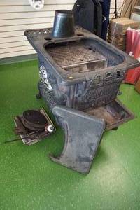 lot 5 image: Antique Fuller Warren Crown Stewart Cast Iron Stove
