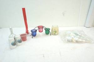 lot 28 image: candles and Las Vegas shakers and bell