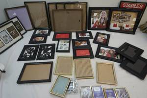 lot 40 image: black and metal framed picture frames